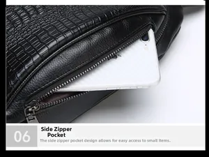 Detail of black crocodile texture chest bag showing side zipper pocket with smartphone storage