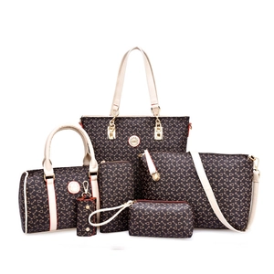 Detail of 6-piece dark brown patterned handbag set featuring a large tote and gold hardware