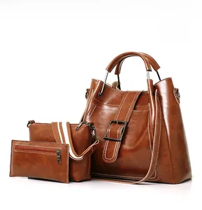 Brown 3-piece PU leather bag set featuring tote, crossbody bag, and small coin purse