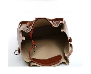 Internal structure of the large brown leather tote bag with light fabric lining and zipper