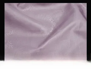 Macro shot of purple high-quality lining fabric with subtle brand logo print details