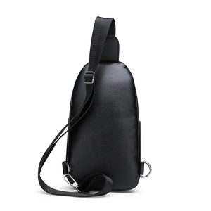 Men's black crossbody chest bag with premium pebbled leather texture and adjustable strap