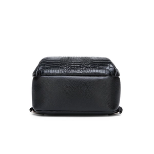 Men's black crocodile texture chest bag with embossed leather and metal rings