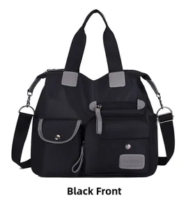 Front view of black waterproof oxford crossbody bag with multiple zipper pockets