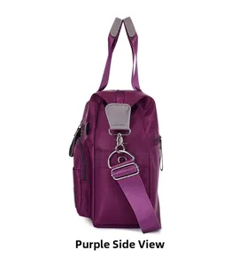Detailed side view of purple waterproof nylon shoulder bag with adjustable strap