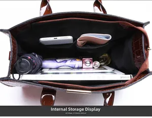Innenansicht der Kroko-Handtasche mit mehreren Fächern und viel Stauraum für Utensilien