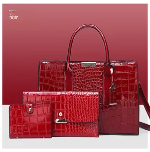 Dreiteiliges rotes Handtaschen-Set mit Krokodilmuster-Prägung und goldenen Beschlägen