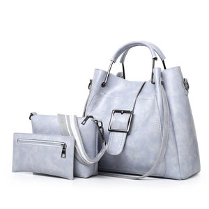 Three-piece women's handbag set in light blue marble pattern with metal buckle decor