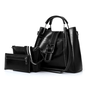 3-piece black PU leather handbag set with white contrast stitching and shoulder strap