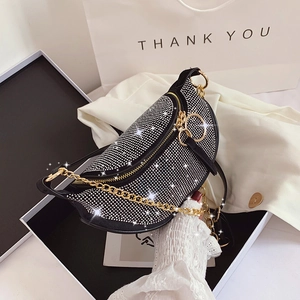 Sparkling black rhinestone crescent bag with gold chain strap for party and evening use