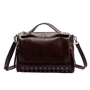 Retro dark brown Boston handbag with vintage studs and adjustable shoulder strap