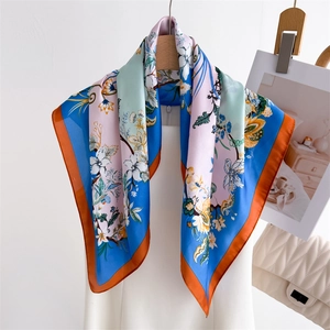 Floral print silk scarf for women with blue pink flowers and orange contrast border