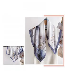 Detailed macro view of ink wash lotus silk scarf with elegant grey-purple border finish
