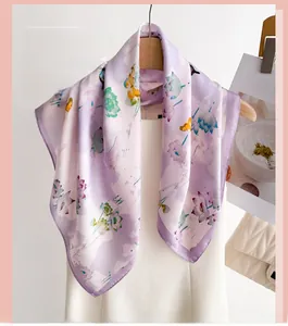 Detail of silk-like scarf featuring elegant lavender floral and butterfly print on a hanger