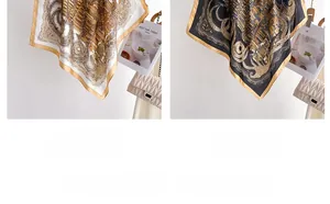 Detail view of architectural print silk scarves in golden yellow and elegant black tones