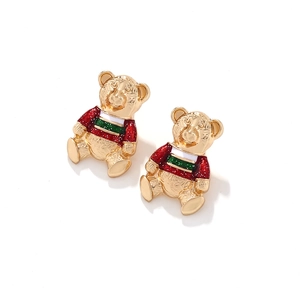 Schattige teddybeer emaille oorbellen met rood-groene glittertruien op goud metaal