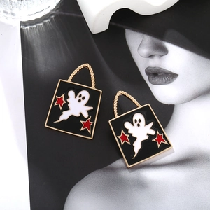 Vintage Halloween ghost earrings with black enamel square charms and star details