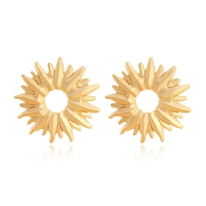 Detailed view of gold sunburst stud earrings with hollow design and shiny metallic finish