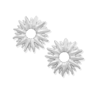 Macro detail of silver sunflower earrings featuring hollow centers and irregular radial petals