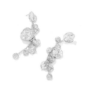 Detailed macro view showing the crinkled texture of silver metallic round fringe earrings