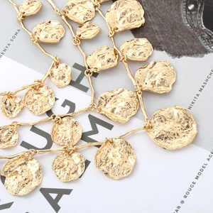 Chic multi-layered gold irregular hammered disc necklace with elegant metallic finish