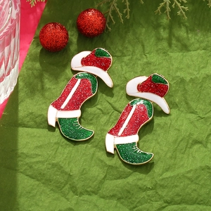 Detail of Christmas western boots earrings with sparkling red green glitter and hat