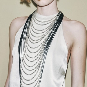 Multi-strand chunky beaded waterfall necklace with layered black ropes and silver beads