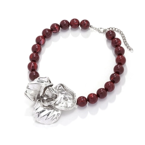 Statement necklace with burgundy resin beads and a large silver vintage floral pendant