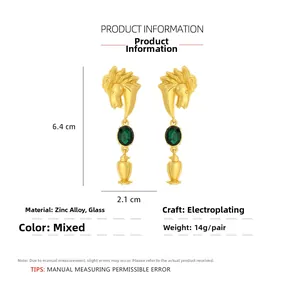 Detail of vintage gold horse head earrings with green glass stone and 6.4cm height specs