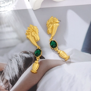 Vintage gold horse head earrings with green gemstone and matte finish in retro style