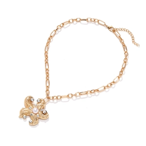 Collier vintage étoile de mer dorée avec perle blanche et strass étincelants