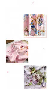 Détail d'un foulard en soie aux imprimés floraux élégants et aux bords bien finis