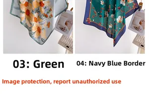 Detail view of floral print silk scarves in light blue and dark green satin finish