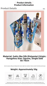 Detail of blue floral satin scarf showing lightweight texture and square silk-like fabric