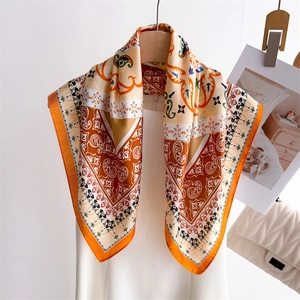 Elegant paisley floral square silk scarf for women in orange and emerald green tones