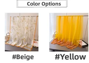 Detail of beige and yellow printed scarves in soft, lightweight translucent fabric