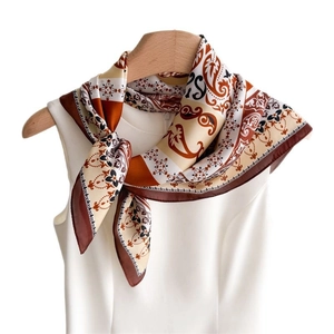 Elegant paisley print silk scarf for women in earthy brown and beige tones