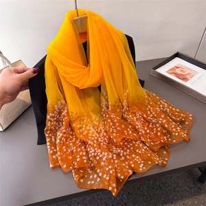 Elegant orange gradient long silk scarf with floral print and soft semi-transparent fabric