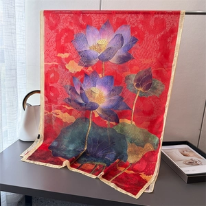 Luxurious red silk scarf featuring elegant purple magnolia floral print and gold edges
