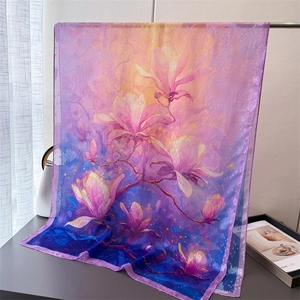 Detailed texture of colorful magnolia flower print on sheer silk long scarf and shawl
