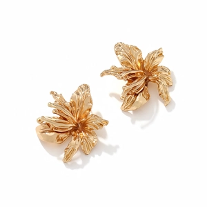 Luxurious large gold flower stud earrings with detailed textured metal floral petals