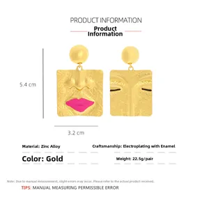Detail of vintage gold abstract face earrings with pink lips and size measurements