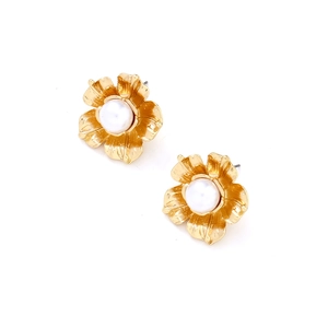 Retro gold flower stud earrings with textured petals and center pearl on white backdrop