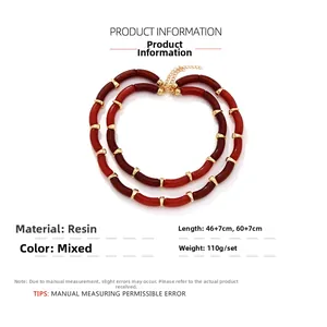 Detail of layered resin bamboo necklace set with dimensions 46+7cm and 60+7cm in dark red