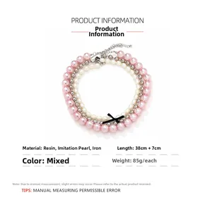 Collier à trois rangs en perles fantaisie avec nœud en ruban noir et chaîne en métal