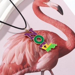 Mardi Gras NOEL letter pendant necklace with colorful enamel on a black adjustable cord