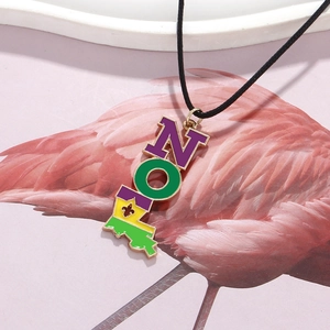 New Orleans Mardi Gras boot necklace with purple green gold pendant on adjustable black cord