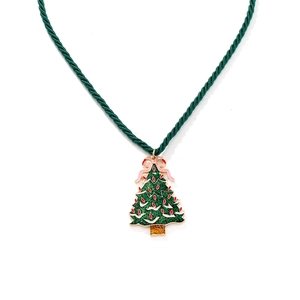 Christmas tree pendant necklace with green glitter and pink bow on dark green woven cord