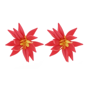 Macro shot of layered handmade beaded floral earrings with magenta petals and amber centers