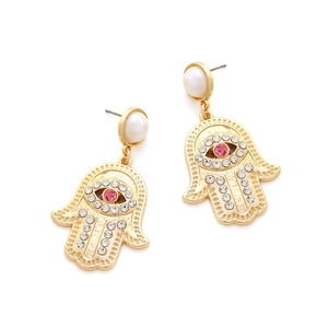 Detailed close-up of Hamsa Hand drop earrings with pink evil eye and white crystals